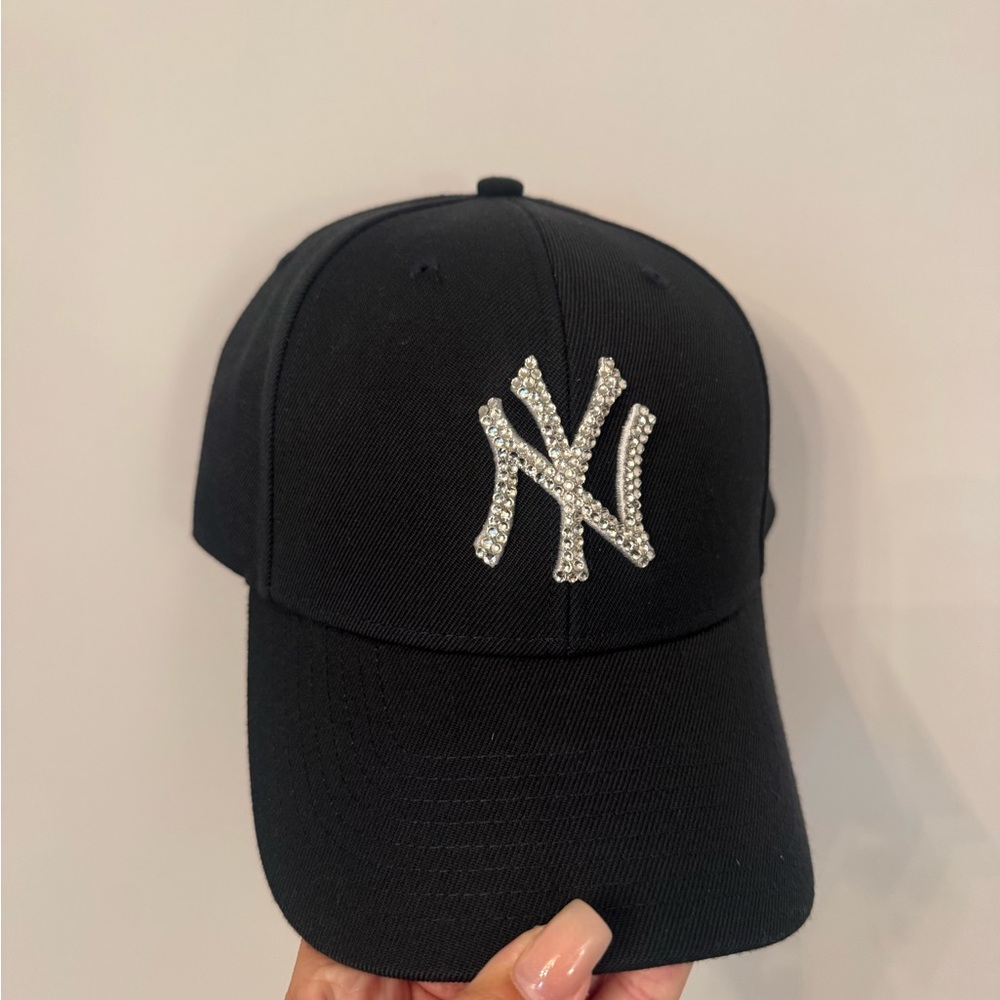 Navy blue Yankee hat with rhinestone logo